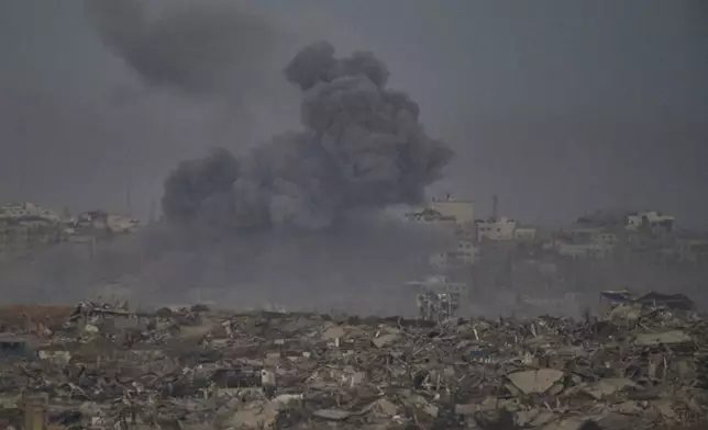 Smoke rises to the sky following an Israeli military strike in the northern Gaza Strip, as seen from southern Israel, Saturday, Sept. 20, 2025. (AP Photo/Leo Correa)