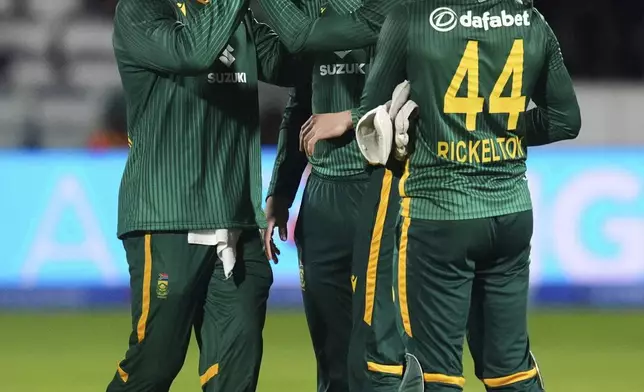 South Africa's Keshav Maharaj, second right, celebrates with teammates after taking the wicket of England's Will Jacks during the second ODI series cricket match between England and South Africa, at Lord's, in London, Thursday Sept. 4, 2025. (Adam Davy/PA via AP)