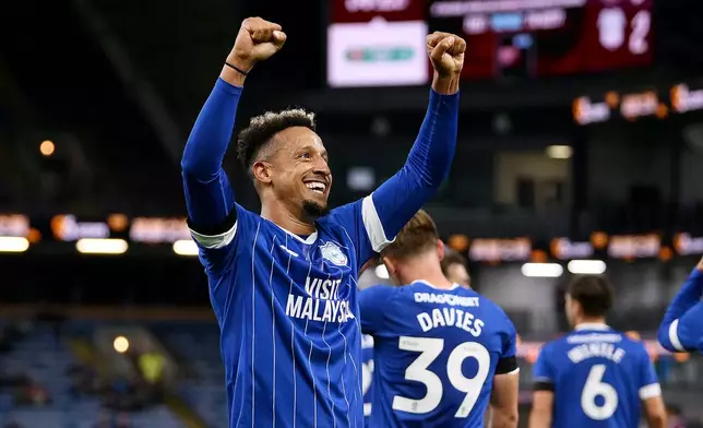 Cardiff City's Callum Robinson celebrates scoring during the English League Cup third round match between Burnley and Cardiff City at Turf Moor, Burnley, England, Tuesday Sept. 23, 2025. (Gary Oakley/PA via AP)