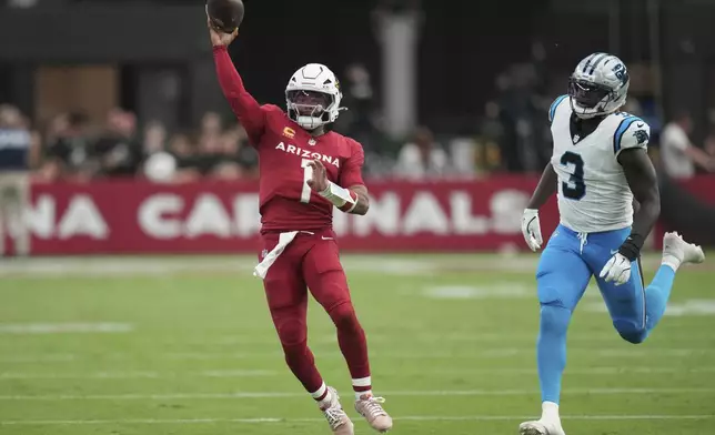 Arizona Cardinals quarterback Kyler Murray (1) throws against the Carolina Panthers during the first half of an NFL football game, Sunday, Sept. 14, 2025, in Glendale, Ariz. (AP Photo/Rick Scuteri)