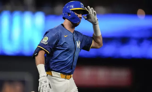 Minnesota Twins' Kody Clemens (18) celebrates his solo home run in the ninth inning of a baseball game against the Arizona Diamondbacks, Friday, Sept. 12, 2025, in Minneapolis. (AP Photo/Mike Stewart)