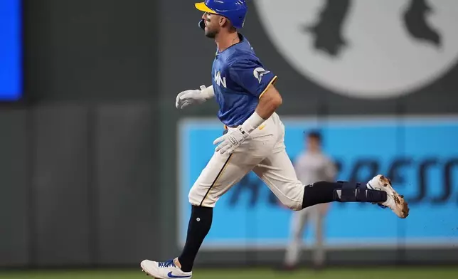 Minnesota Twins' Kody Clemens (18) runs to second base on his RBI-double in the sixth a baseball game against the Arizona Diamondbacks, Friday, Sept. 12, 2025, in Minneapolis. (AP Photo/Mike Stewart)