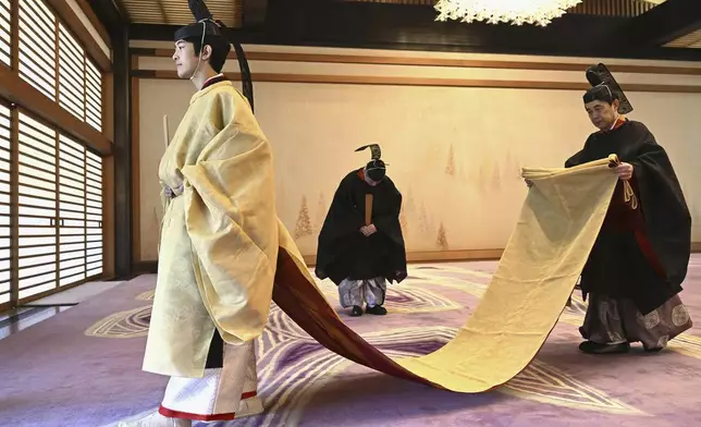 Japanese Prince Hisahito is seen in ceremonial attire during his coming-of-age rites in the Imperial Palace on his 19th birthday in Tokyo on Saturday, Sept. 6, 2025. (Kyodo News via AP)