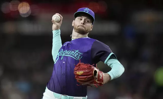 Arizona Diamondbacks starting pitcher Ryne Nelson throws against the Philadelphia Phillies during the first inning of a baseball game Friday, Sept. 19, 2025, in Phoenix. (AP Photo/Ross D. Franklin)