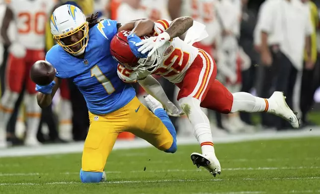 Kansas City Chiefs cornerback Trent McDuffie breaks up a pass intended for Los Angeles Chargers wide receiver Quentin Johnston during the second half of an NFL football game, Friday, Sept. 5, 2025, in Sao Paulo. (AP Photo/Fernando Llano)