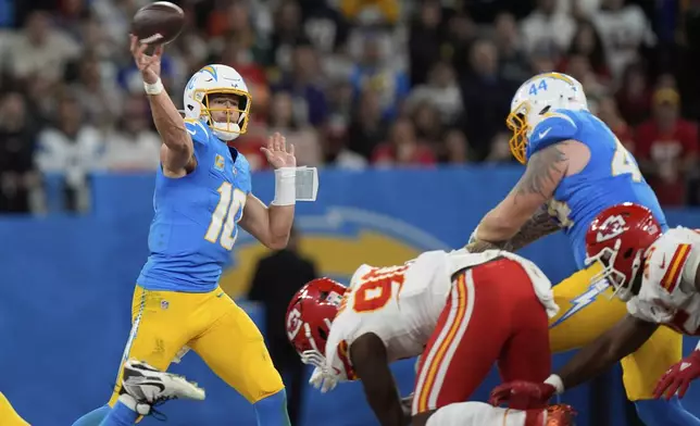 Los Angeles Chargers quarterback Justin Herbert passes against the Kansas City Chiefs during the second half of an NFL football game, Friday, Sept. 5, 2025, in Sao Paulo. (AP Photo/Fernando Llano)