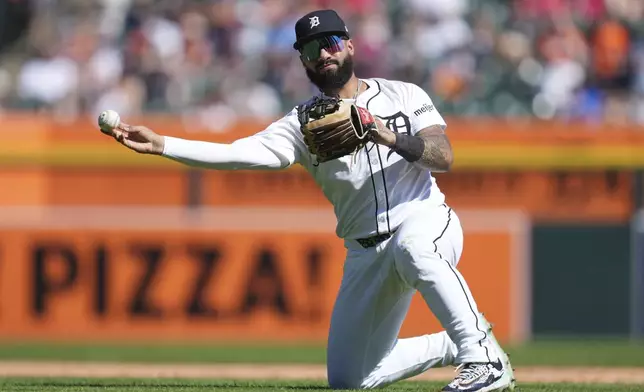 Detroit Tigers second baseman Gleyber Torres (25) throws to first base for an out on a New York Mets' Brett Baty ground ball in the seventh inning during a baseball game Monday, Sept. 1, 2025, in Detroit. (AP Photo/Paul Sancya)
