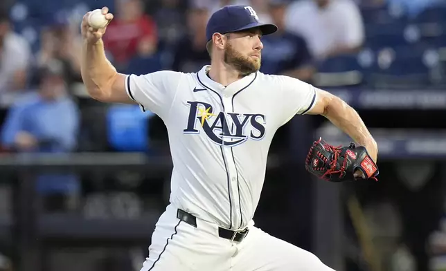 Tampa Bay Rays pitcher Adrian Houser delivers to the Seattle Mariners during the first inning of a baseball game Wednesday, Sept. 3, 2025, in Tampa, Fla. (AP Photo/Chris O'Meara)