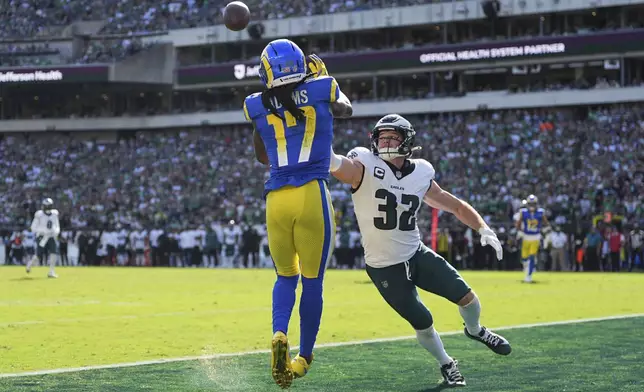 Philadelphia Eagles safety Reed Blankenship (32) breaks up a pass intended for Los Angeles Rams wide receiver Davante Adams (17) during the second half of an NFL football game Sunday, Sept. 21, 2025, in Philadelphia. (AP Photo/Matt Rourke)