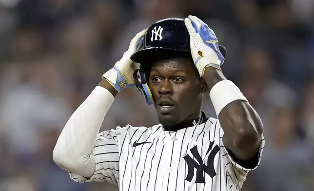 New York Yankees' Jazz Chisholm Jr. reacts after being called out on strikes during the second inning of a baseball game against the Toronto Blue Jays, Friday, Sept. 5, 2025, in New York. (AP Photo/Adam Hunger)