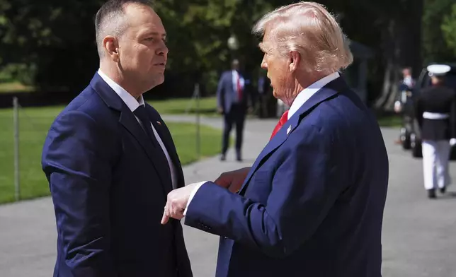 President Donald Trump greets Polish President Karol Nawrocki at the White House, Wednesday, Sept. 3, 2025, in Washington. (AP Photo/Evan Vucci)