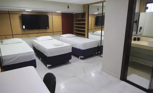 Beds sit in a room as part of accommodations at Hotel COP 30 for the upcoming COP30 U.N. Climate Summit in Belem, Brazil, Sept.18, 2025. (AP Photo/Paulo Santos)