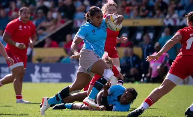 Fiji's Josifini Neihamu in action during the Women's Rugby World Cup 2025 pool B match between Wales and Fiji at Sandy Park, Exeter, England, Saturday Sept. 6, 2025. (Ben Birchall/PA via AP)