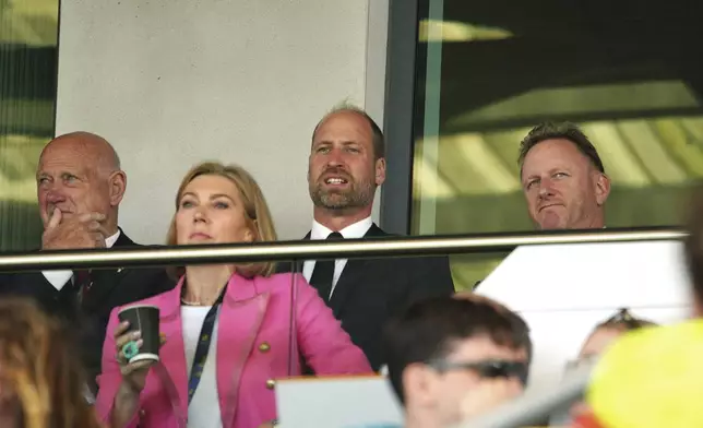 Britain's Prince William attends the Women's Rugby World Cup 2025 pool B match between Wales and Fiji at Sandy Park, Exeter, England, Saturday Sept. 6, 2025. (Ben Birchall/PA via AP)