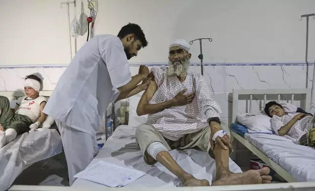 Afghans injured during a powerful earthquake that struck eastern Afghanistan Sunday, are treated at Nangarhar Regional hospital in Jalalabad, Afghanistan, Wednesday, Sept. 3, 2025.(AP Photo/Siddiqullah Alizai)