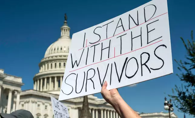 Protesters rally at a news conference calling for Congress to release all of the Jeffrey Epstein files, outside the U.S. Capitol, Wednesday, Sept. 3, 2025 in Washington. (AP Photo/Kevin Wolf)