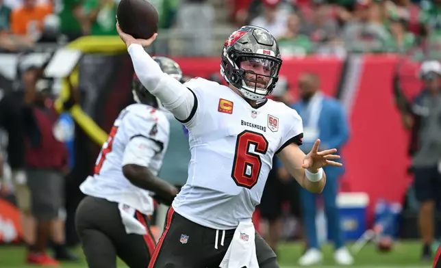 Tampa Bay Buccaneers quarterback Baker Mayfield (6) throws during the first half of an NFL football game against the Philadelphia Eagles, Sunday, Sept. 28, 2025, in Tampa, Fla. (AP Photo/Jason Behnken)
