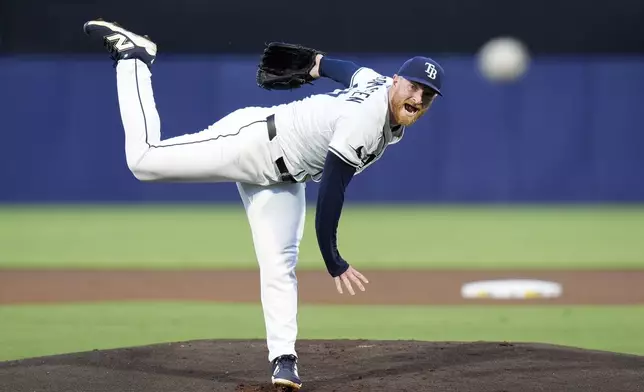 Tampa Bay Rays' Drew Rasmussen pitches to the Seattle Mariners during the first inning of a baseball game Tuesday, Sept. 2, 2025, in Tampa, Fla. (AP Photo/Chris O'Meara)