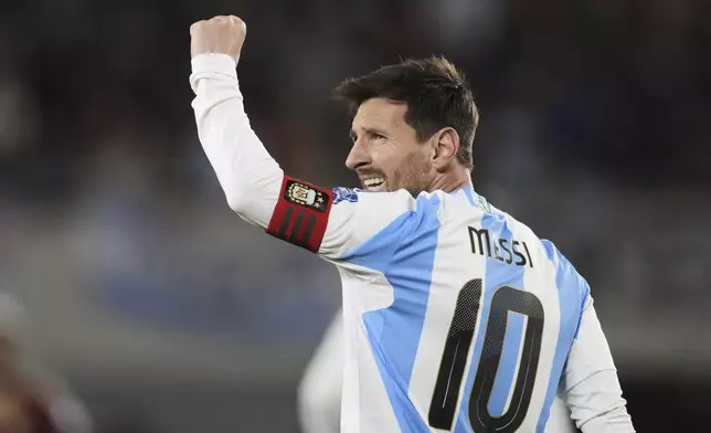 Argentina's Lionel Messi celebrates scoring his side's third goal against Venezuela during a World Cup 2026 qualifying soccer match at the Monumental stadium in Buenos Aires, Argentina, Thursday, Sept. 4, 2025. (AP Photo/Gustavo Garello)