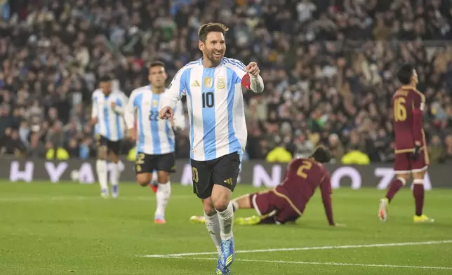 Argentina's Lionel Messi celebrates scoring his side's third goal against Venezuela during a World Cup 2026 qualifying soccer match at the Monumental stadium in Buenos Aires, Argentina, Thursday, Sept. 4, 2025. (AP Photo/Gustavo Garello)