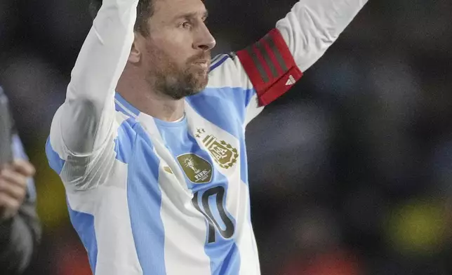 Argentina's Lionel Messi waves at the end of a World Cup 2026 qualifying soccer match against Venezuela at the Monumental stadium in Buenos Aires, Argentina, Thursday, Sept. 4, 2025. (AP Photo/Gustavo Garello)