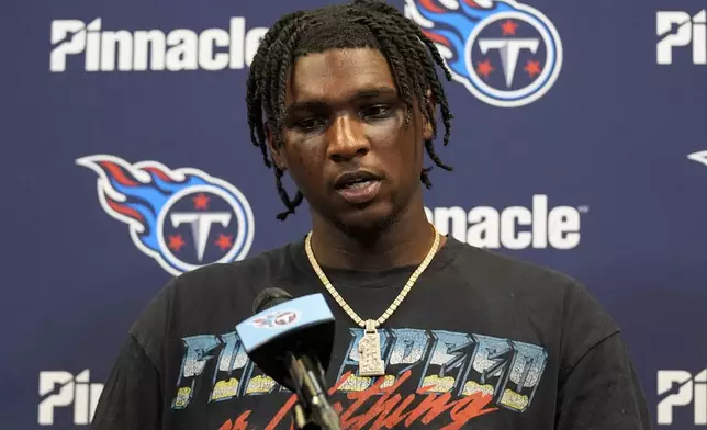 Tennessee Titans quarterback Cam Ward speaks during a news conference after an NFL football game between the Atlanta Falcons and the Tennessee Titans, Friday, Aug. 15, 2025, in Atlanta. (AP Photo/Brynn Anderson)