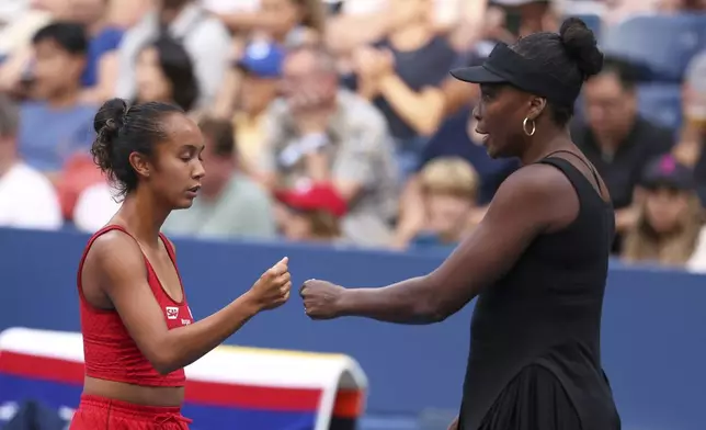 Venus Williams, of the United States, and doubles partner Leylah Fernandez, of Canada, celebrate during a doubles match of the U.S. Open tennis championships, Tuesday, Sept. 2, 2025, in New York. (AP Photo/Heather Khalifa)