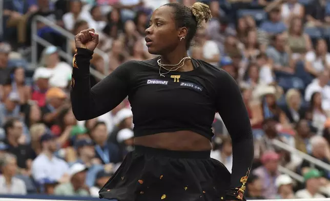 Taylor Townsend, of the United States, reacts after a shot with her teammate Katerina Siniakova, of the Czech Republic, as they face Venus Williams, of the United States, and Leylah Fernandez, of Canada, during a quarterfinal doubles match of the U.S. Open tennis championships, Tuesday, Sept. 2, 2025, in New York. (AP Photo/Heather Khalifa)