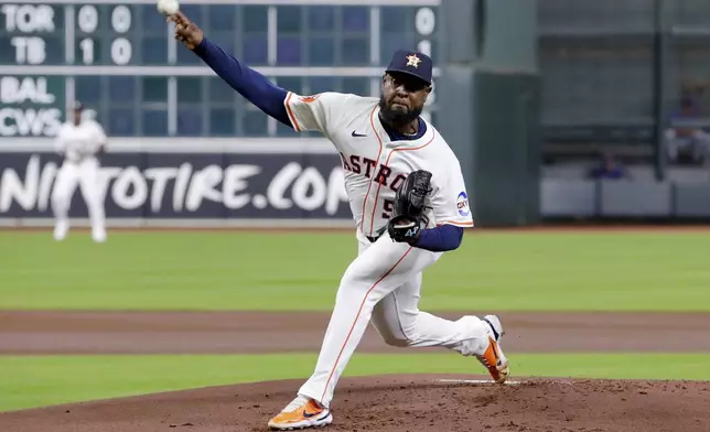 Houston Astros starting pitcher Cristian Javier throws against the Texas Rangers during the first inning of a baseball game Wednesday, Sept. 17, 2025, in Houston. (AP Photo/Michael Wyke)