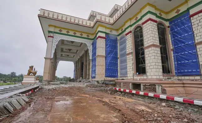 Rebuilding work is underway at the parliament building that was damaged in the March 28 earthquake in Naypyitaw, Myanmar, Thursday, Aug. 28, 2025. (AP Photo/Aung Shine Oo)