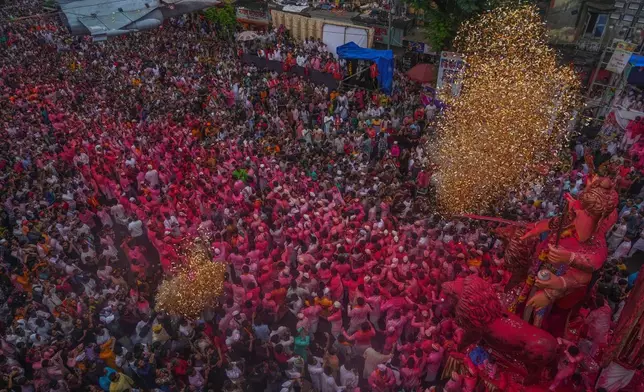 An idol of elephant-headed Hindu god Ganesha is taken for immersion on the final day of the ten-day long Ganesh Chaturthi festival in Mumbai, India, Saturday, Sept. 6, 2025. (AP Photo/Rafiq Maqbool)