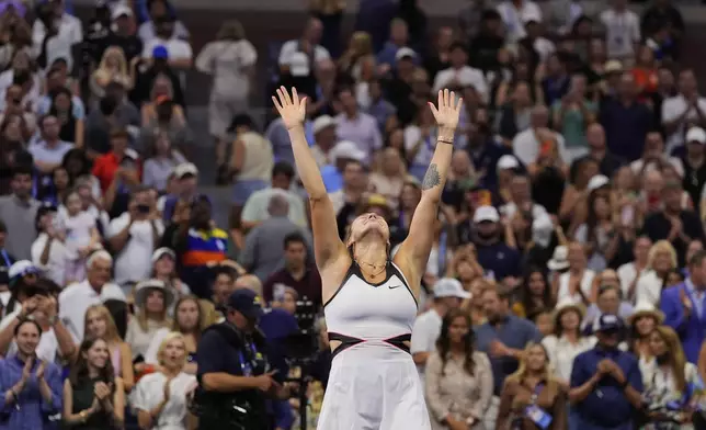 Aryna Sabalenka, of Belarus, reacts after defeating Amanda Anisimova, of the United States, during the women's finals of the U.S. Open tennis championships, Saturday, Sept. 6, 2025, in New York. (AP Photo/Yuki Iwamura)