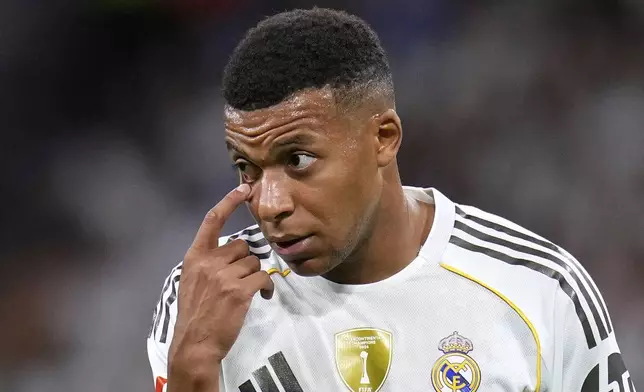 Real Madrid's Kylian Mbappe gestures during the Spanish La Liga soccer match between Real Madrid and Mallorca in Madrid, Saturday, Aug. 30, 2025. (AP Photo/Manu Fernandez)