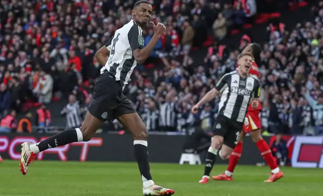 FILE - Newcastle's Alexander Isak celebrates after scoring his side's second goal during the EFL Cup final soccer match between Liverpool and Newcastle at Wembley Stadium in London, Sunday, March 16, 2025. (AP Photo/Scott Heppell, File)
