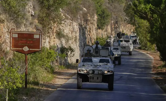 French U.N. peacekeepers patrol at the Suluki Valley, south Lebanon, Wednesday, Aug. 20, 2025. (AP Photo/Hussein Malla)