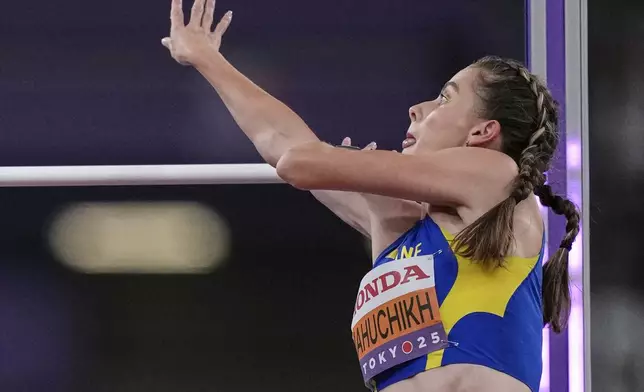 Ukraine's Yaroslava Mahuchikh competes in the women's high jump final at the World Athletics Championships in Tokyo, Sunday, Sept. 21, 2025. (AP Photo/Louise Delmotte)