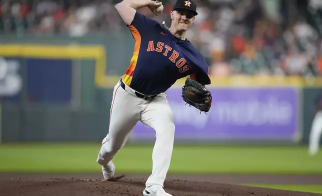 Houston Astros starting pitcher Hunter Brown throws during the first inning of a baseball game against the Los Angeles Angels in Houston, Sunday, Aug. 31, 2025. (AP Photo/Ashley Landis)