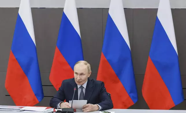 Russian President Vladimir Putin chairs a meeting of the Military-Industrial Commission in Perm, Russia, Friday, Sept. 19, 2025. (Gavriil Grigorov, Sputnik, Kremlin Pool Photo via AP)