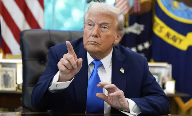 President Donald Trump speaks in the Oval Office of the White House, Friday, Sept. 19, 2025, in Washington. (AP Photo/Alex Brandon)