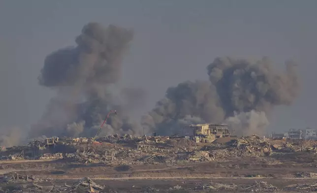 Smoke rises following an explosion in the Gaza Strip, as seen from southern Israel, Tuesday, Sept. 2, 2025. (AP Photo/Ohad Zwigenberg)