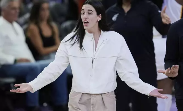 Indiana Fever's Caitlin Clark reacts at the end of the first half of a WNBA basketball game against the Golden State Valkyries, Sunday, Aug. 31, 2025, in San Francisco. (AP Photo/Godofredo A. Vásquez)