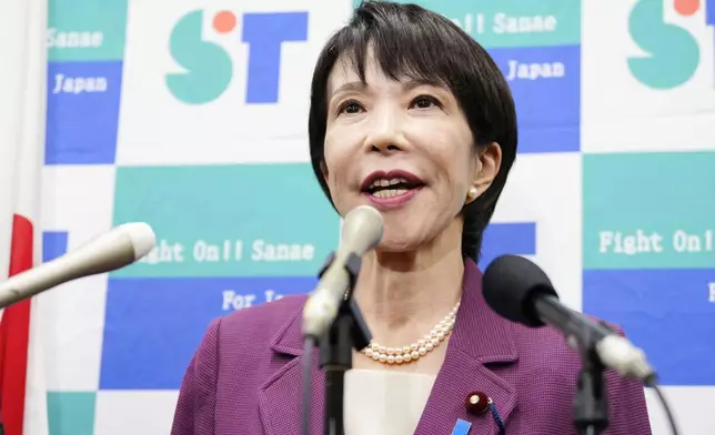 Japan's Former Economic Security Minister Sanae Takaichi speaks to the media regarding the upcoming upcoming ruling Liberal Democratic Party's leadership election, at parliament in Tokyo, on Sept. 18, 2025. (Yohei Fukai/Kyodo News via AP)