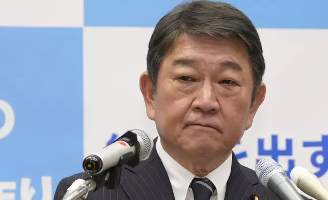 Japan's former Foreign Minister and former secretary general of the ruling Liberal Democratic Party Toshimitsu Motegi announces his bid to run in the upcoming party's leadership election, at parliament in Tokyo, on Sept. 10, 2025. (Daisuke Suzuki/Kyodo News via AP)