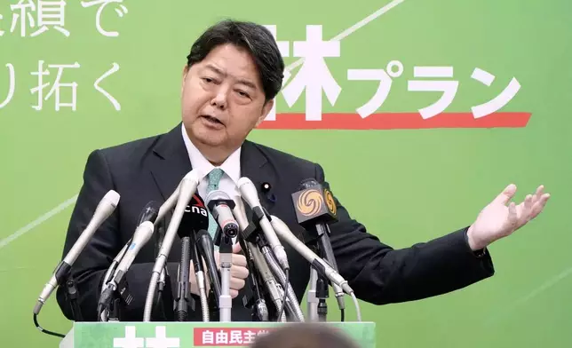 Japan's Chief Cabinet Secretary Yoshimasa Hayashi announces his bid to run in the upcoming ruling Liberal Democratic Party's leadership election, at parliament in Tokyo, on Sept. 18, 2025. (Keisuke Hosojima/Kyodo News via AP)