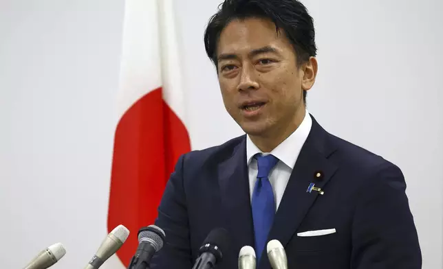 Japan's Agriculture Minister Shinjiro Koizumi, who is the son of former prime minister Junichiro Koizumi, attends a press conference about his running in the ruling Liberal Democratic Party leadership race in Tokyo, Japan, Saturday, Sept. 20, 2025. (Issei Kato/Pool Photo via AP)