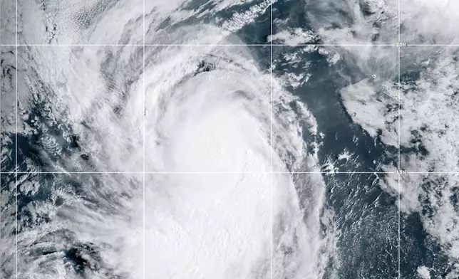 This NOAA satellite image taken at 11:39 a.m. EST on Thursday, Sept. 25, 2025, shows Hurricane Narda in the North Pacific Ocean. (NOAA via AP)