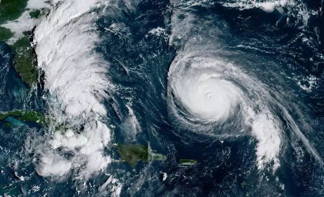 This GOES-19 GeoColor satellite image taken Sunday, Sept. 28, 2025 and provided by NOAA, shows weather systems in the tropical Atlantic Ocean. (NOAA via AP)