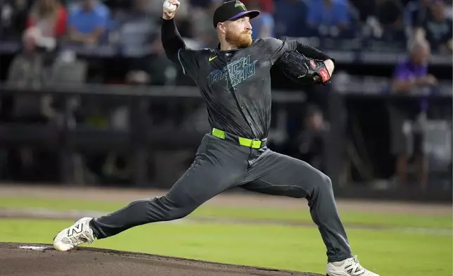Tampa Bay Rays' Drew Rasmussen pitches to the Boston Red Sox during the first inning of a baseball game Friday, Sept. 19, 2025, in Tampa, Fla. (AP Photo/Chris O'Meara)