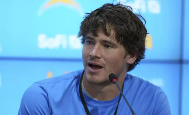 Los Angeles Chargers quarterback Justin Herbert speaks during a news conference prior to an NFL football game against the Kansas City Chiefs in Sao Paulo, Wednesday, Sept. 3, 2025. (AP Photo/Fernando Llano)