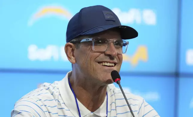 Los Angeles Chargers head coach Jim Harbaugh speaks during a news conference prior to an NFL football game against the Kansas City Chiefs in Sao Paulo, Wednesday, Sept. 3, 2025. (AP Photo/Fernando Llano)
